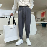 Eoior New Fashion Spring Summer Pants Men Tapered Bottom Slit Trousers Korean Style White Khaki Black Elastic Waist Casual Pants Man